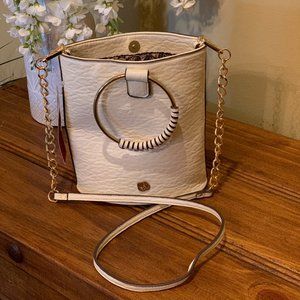 Beautiful hand held or crossbody bag by Carlos Santana.